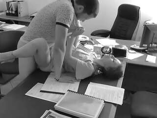 The boss fucks his tiny secretary on the office table and clips it on hidden camera