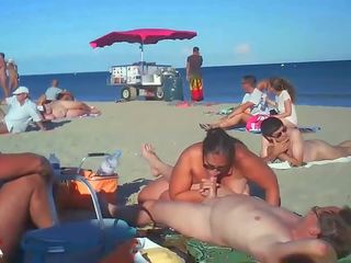 Milf Blows Her mademoiselle On Nude Beach By Voyeurs